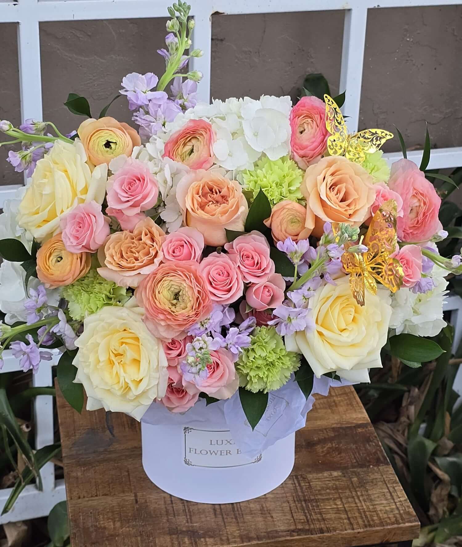 Garden roses ,ranunculus, spay roses, carnation, matiola, hydrangea